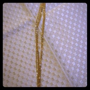 14K Gold 7 1/2inch Multi Strand Bracelet.