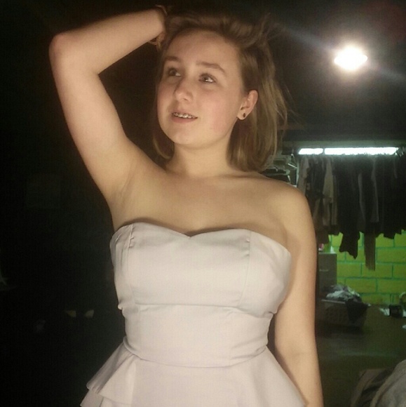 Grey-pink peplum sided dress.