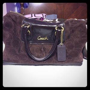 Hand bag with a shoulder strap