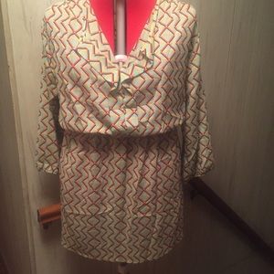 Long sleeve, v-neck, a-line dress.