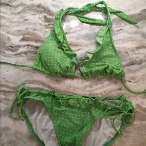 Green and white polka dot suit