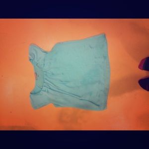 Two identical blouses