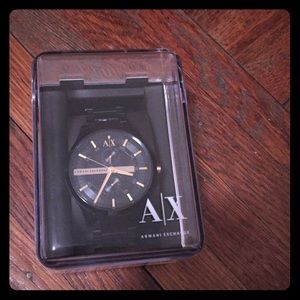Armani Exchange black and gold watch