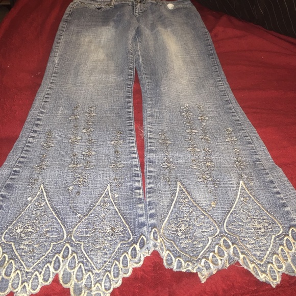 Embellished jeans with silver rhinestones.