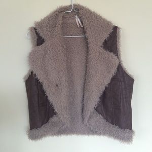 Faux fur and leather vest