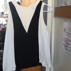 Sleeveless black and white blouse