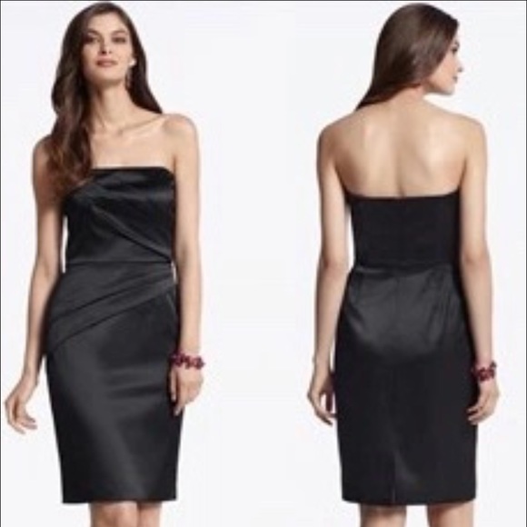 Glamorous black strapless dress.