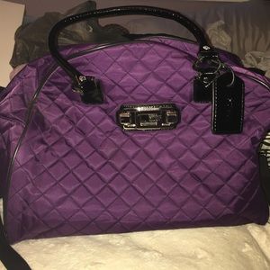 Guess carry travel bag with luggage handle