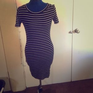 Short, form fitting striped t-shirt dress