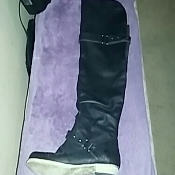 Carlos Santana thigh boot