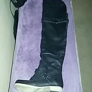 Carlos Santana thigh boot