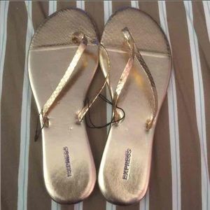 New women's express rose gold SZ 8 slippers