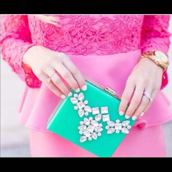 Brand new mint glam clutch .Retail $68