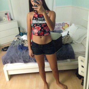 Floral Top that says "SHAMELESS"