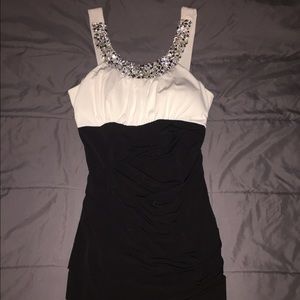 Mini black and white dress.
