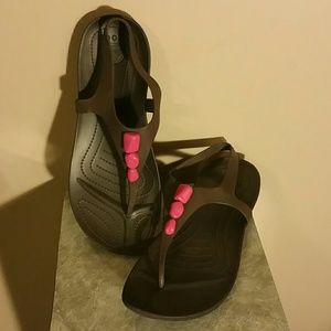 Brand new Crocs sandles brown w/ pink stone detail