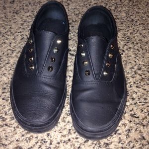 Black/gold leather vans