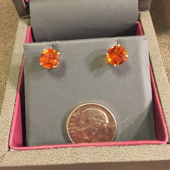 Genuine round citrine studs in 14k