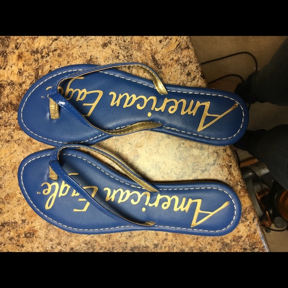 SALE 1 hourAmerican eagle blue and gold flip flops