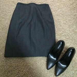 Worn once. Pencil dark grey skirt