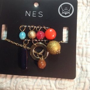 BNWT Multi-charm multi-color gold necklace BNWT Multi-charm multi-color gold necklace