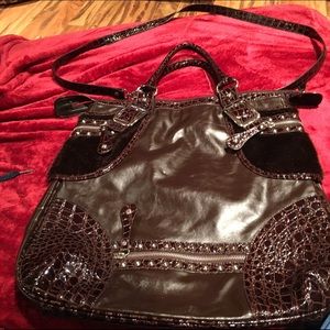 Large fashionable leather and fur tote