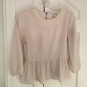 Ivory and pearl peplum top S