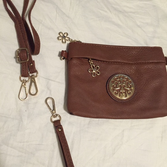 Clutch, Wristlet, Cross Body, and Wallet all in 1