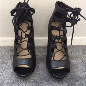 Laced up faux leather booties