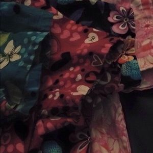 Scrub top bundle. Four like new scrub tops.