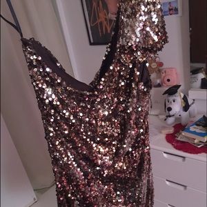 Gold Sequin dress.