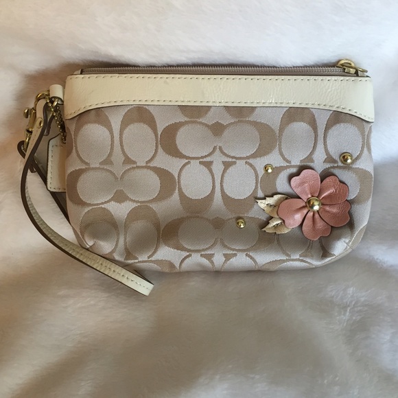 Authentic Coach wristlet.