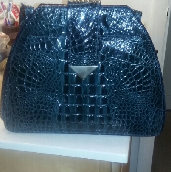 Beautiful crocodile  bag with strap to hang on u