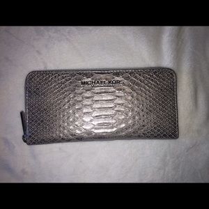 Silver embossed leather continental zip wallet