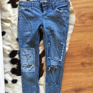 Free people ripped and patched skinny jeans