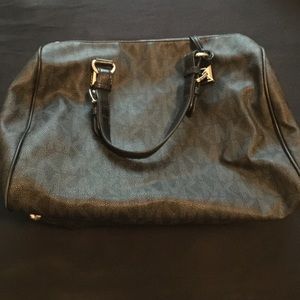Michael Kors black purse .
