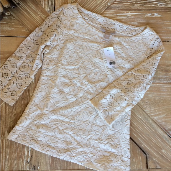 Three quarter sleeve cream lace blouse