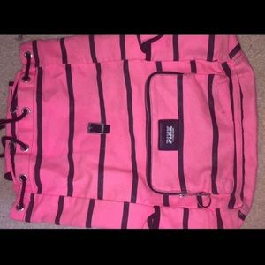 Pink and black VS Pink backpack