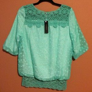 Three-quarter length dress shirt; turquoise color