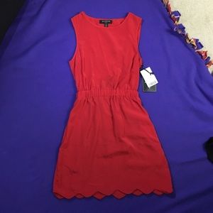 Red scalloped dress!