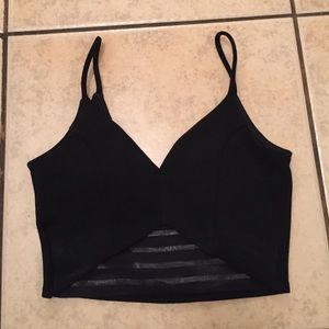Black mini top with sheer mesh detail