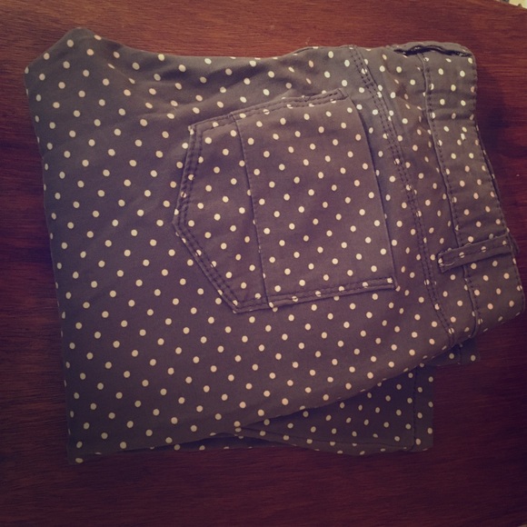 Gray polka dot pants.