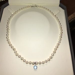 Genuine pearl necklace with aquamarine stone