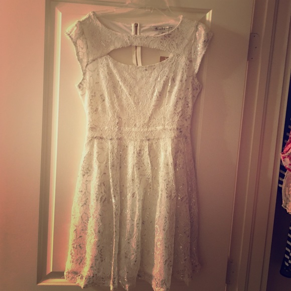 White dress with silver floral design