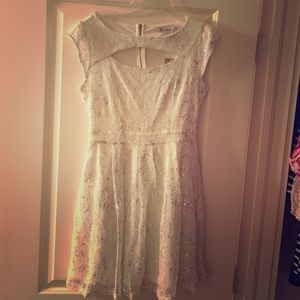 White dress with silver floral design