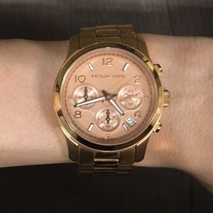 Michael Kors Runway Rosegold midsize watch.