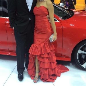 Red mermaid gown with gorgeous ruffled train