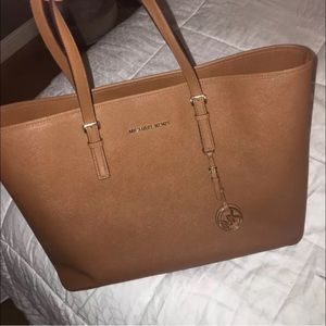 A "jet set travel" Michael Kors tote!
