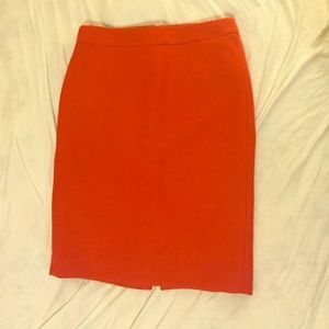 Wool pencil skirt in bright red-orange