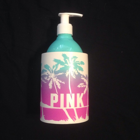 Pink Victoria's Secret lotion and coozie